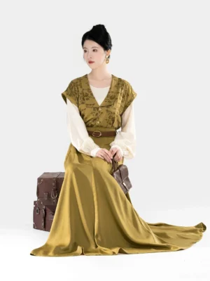 Twilight Harbor modern Tang Dynasty Hanfu full set with mustard floral beizi overlay ivory top and flowing eight-panel skirt seated front view
