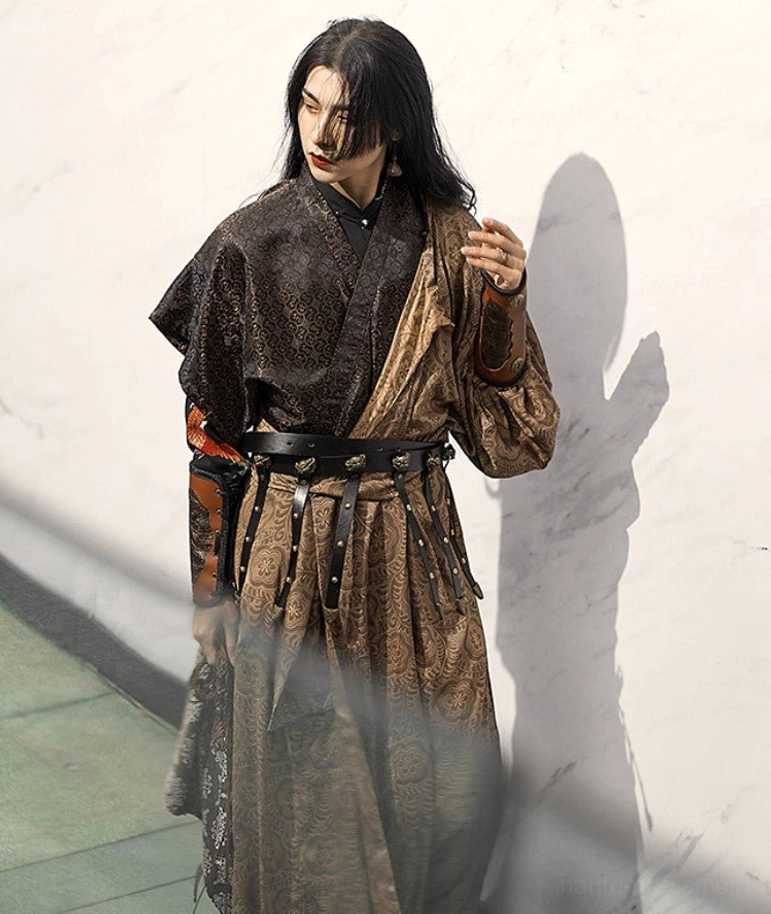 Side view of a model wearing the two tone brown River Essence Tang Dynasty Hanfu robe with multi strap leather waist belt and matching arm guards