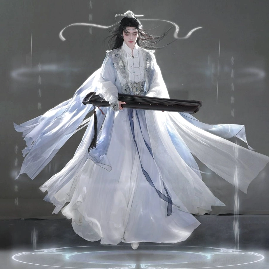 Medium full-body view of a unisex blue and white Hanfu set with wide flowing sleeves, layered garments, a pale blue waist sash, and robes spreading in the wind