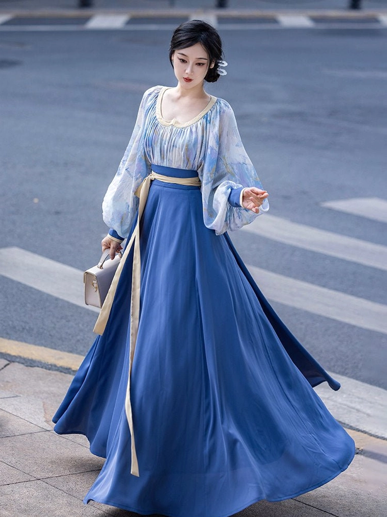 Van Gogh Sea Tang Dynasty Hanfu set modeled from a three quarter angle with printed heart collar blouse flowing navy skirt and elegant waist ribbons