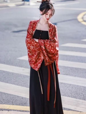 Modern Chinese style Vermilion Bird Song-style Hanfu outfit with red printed cardigan black camisole and wide-leg trousers worn on an urban street