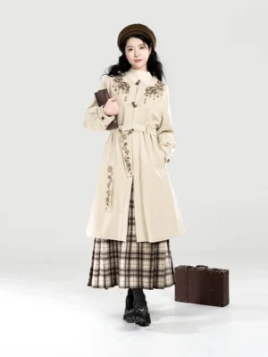 Vintage Chinese-inspired coat and plaid skirt outfit with floral embroidery, horn-style buttons, beret, and book