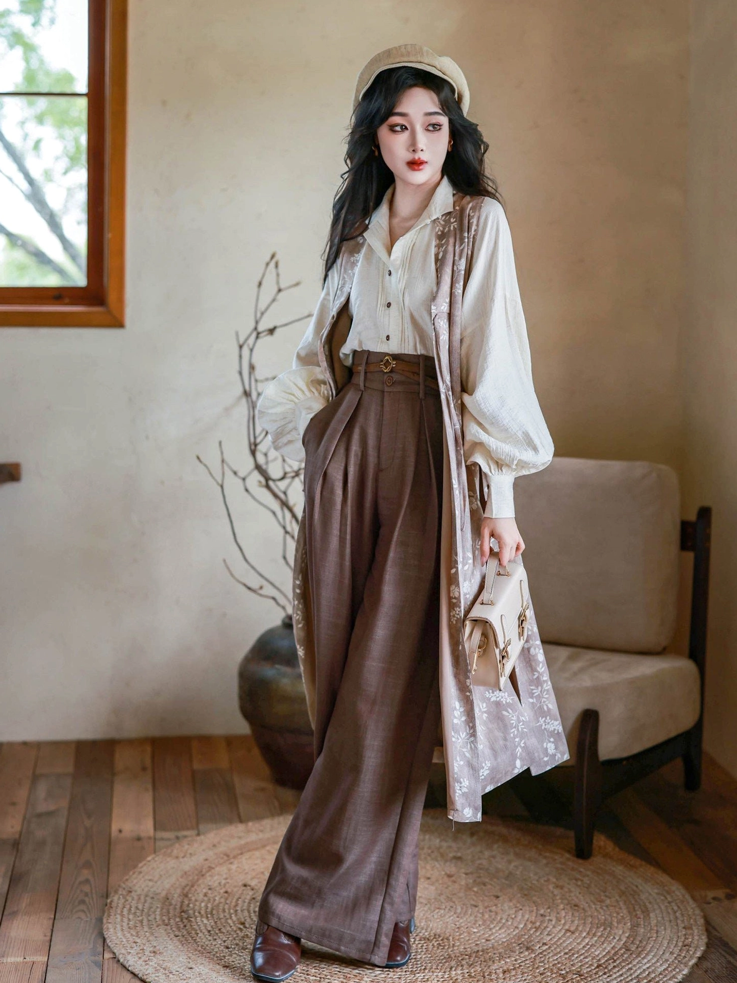 Side angle view of a vintage inspired Chinese hanfu three-piece outfit styled with a newsboy cap and small handbag