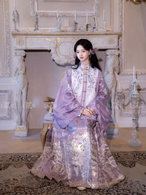 Seated three-quarter view of violet Ming Dynasty Hanfu showing embroidered floral Bijia vest and shimmering gold wisteria patterned Mamianqun skirt