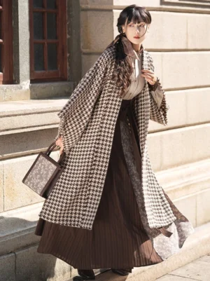 Front full-body view of Warm Autumn modern Song Dynasty Hanfu with long houndstooth beizi outerwear and brown wrap skirt