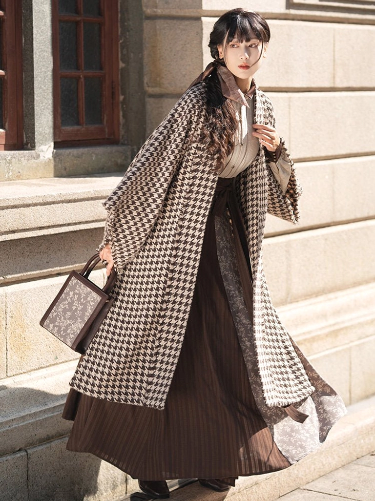 Front full-body view of Warm Autumn modern Song Dynasty Hanfu with long houndstooth beizi outerwear and brown wrap skirt