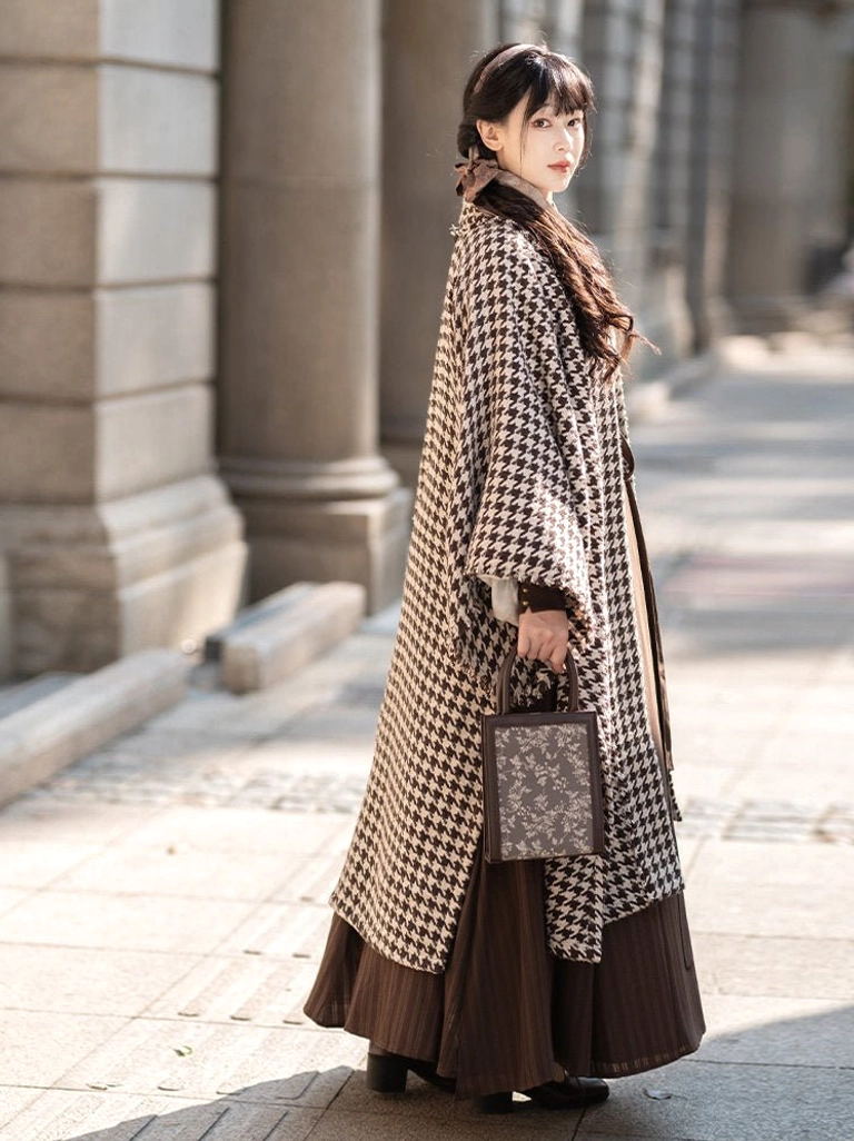 Side view of flowing Warm Autumn Song Dynasty Hanfu beizi coat and high-waisted brown wrap skirt on a vintage street