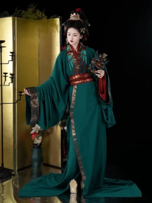 Warring States Han Dynasty emerald green straight hem Hanfu robe set in side view with red inner robe, gold trim, bead jewelry, and red waist sash