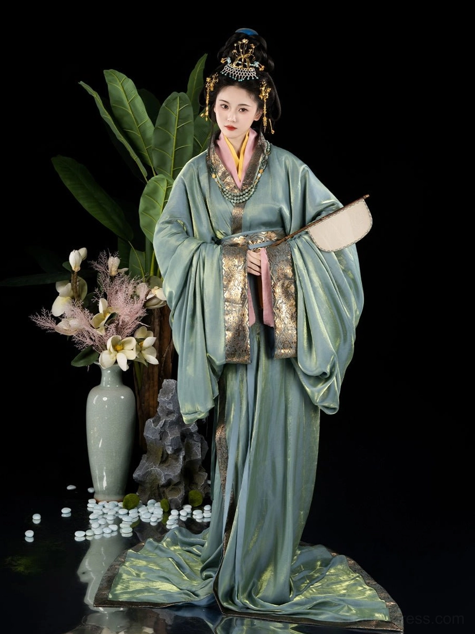 Front view of a dusty cyan blue Warring States and Han Dynasty straight hem hanfu robe with gold trim, layered pink and yellow inner garments, wide sleeves, and a long flowing train