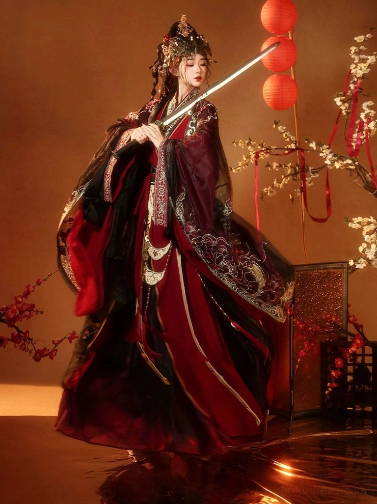 Three-quarter side view of Warring States Hanfu wedding robe with flowing red and black layers gold embroidery and ceremonial sword styling