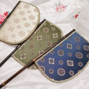 Green white and blue Warring States inspired half-moon Chinese brocade hand fans with gold trim and dark bamboo handles
