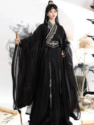 Front full-body view of a black and gold Wei Jin Dynasty Qiyao Ruqun Hanfu with sheer wide sleeves, bamboo embroidery, floor-length skirt, and traditional Chinese styling