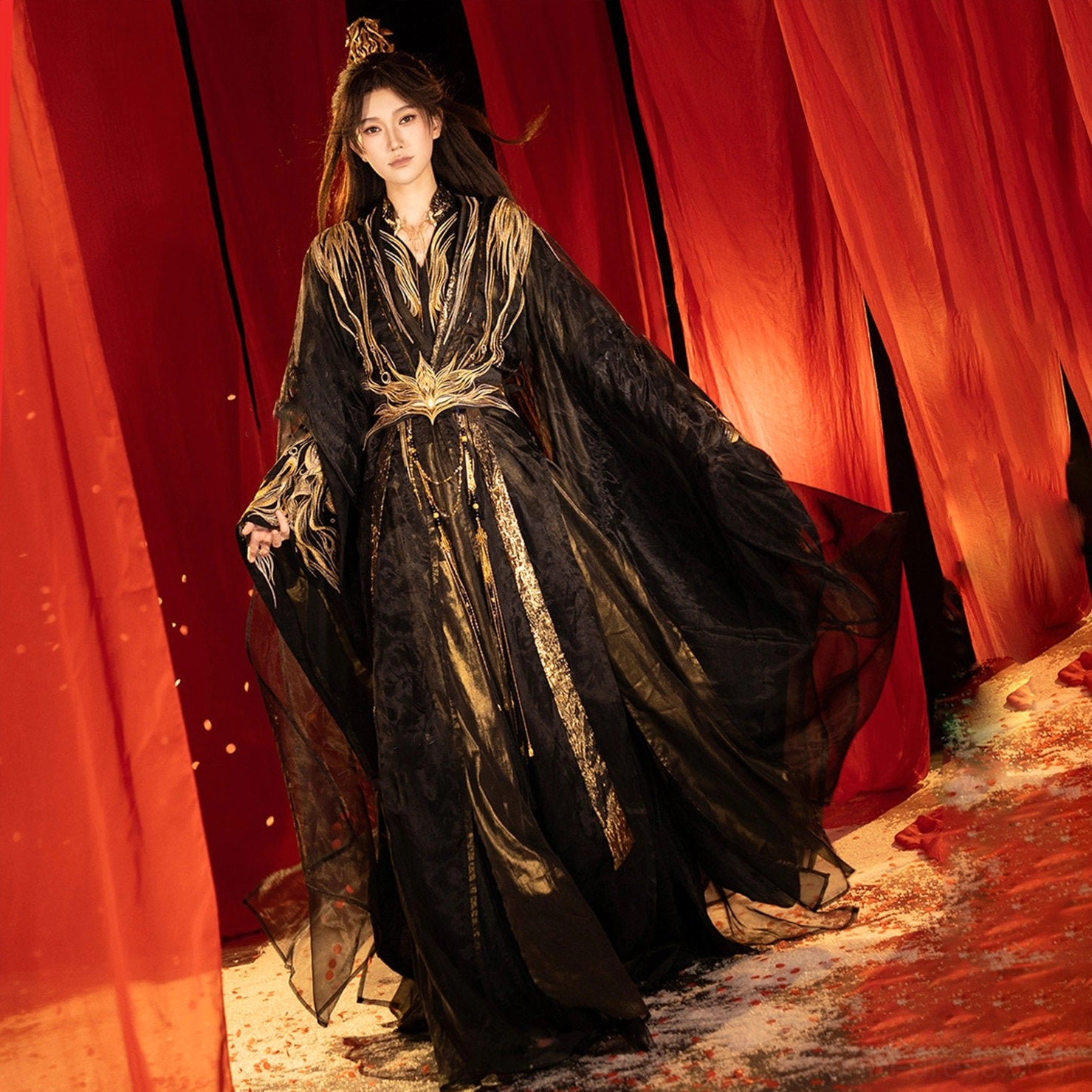 Side view of a Wei Jin Dynasty Hanfu costume with flowing wide sleeves, vertical gold robe accents, ornate waist fastener and long draped silhouette