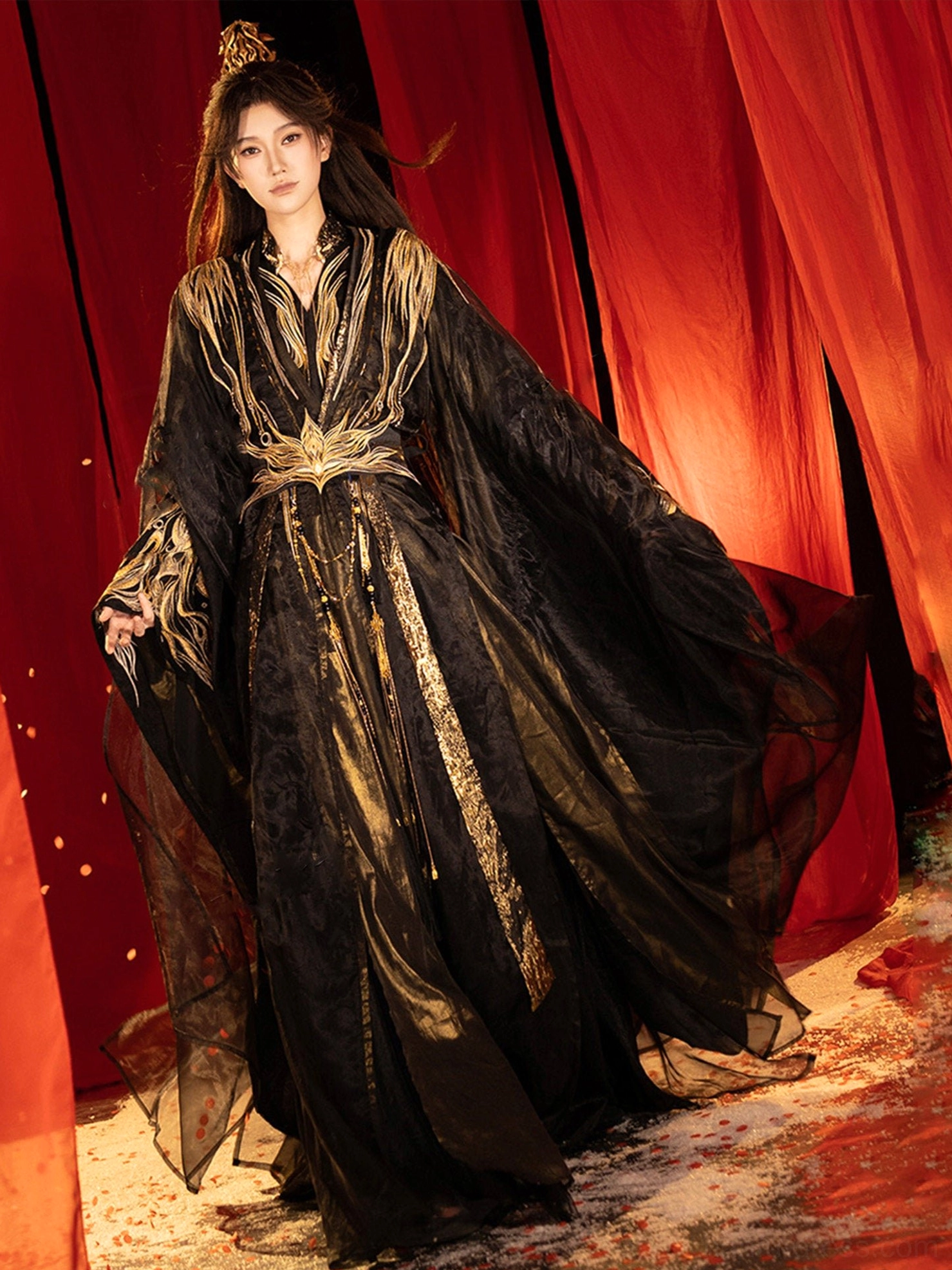 Front view of a Wei Jin Dynasty Qiyao Ruqun Hanfu with black fabric, gold flame embroidery, wide sheer sleeves and ornate waist decoration