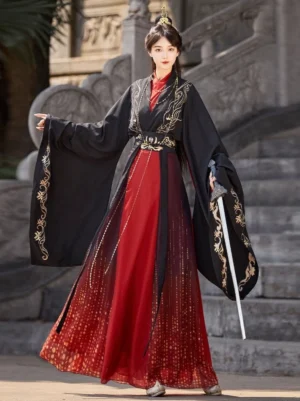 Black and red Wei Jin Dynasty Qiyao Ruqun Hanfu full body front view with gold floral embroidery, flowing wide sleeves, gradient red skirt, decorative waist belt, and traditional Chinese styling