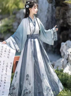 Blue and ivory Wei Jin Dynasty Qiyao Ruqun Hanfu with flowing pleated skirt and calligraphy scroll beside a garden waterfall