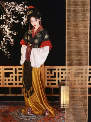 Front view of a Wei Jin Dynasty Qiyao Ruqun Hanfu set with layered white and red sleeves, black embroidered top, golden-yellow apron skirt, and red waist decoration