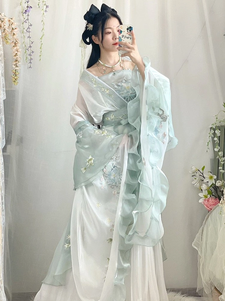 Mint green and ivory Wei Jin Dynasty Qiyao Ruqun Hanfu full set front view with embroidered flowers and flowing ruffled sleeves