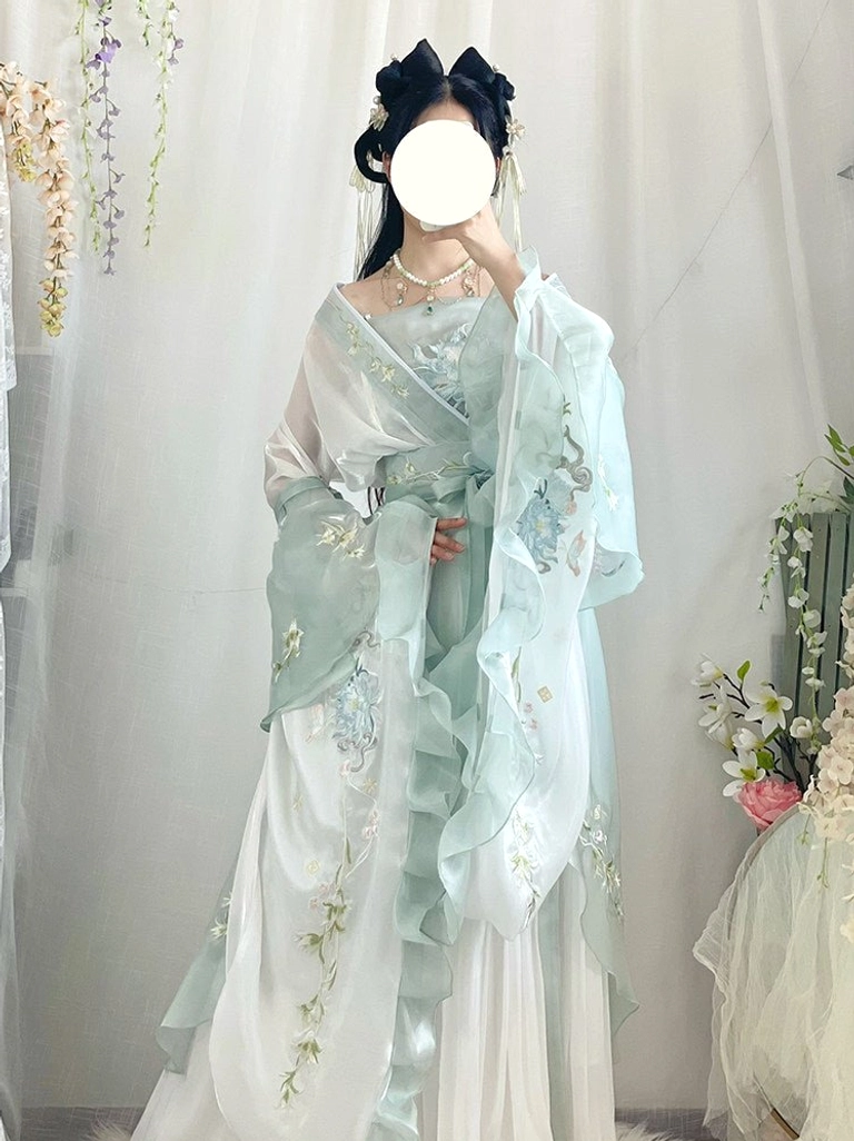 Wei Jin Dynasty Qiyao Ruqun Hanfu in mint green and ivory featuring ruffled wide sleeves floral embroidery and layered skirt