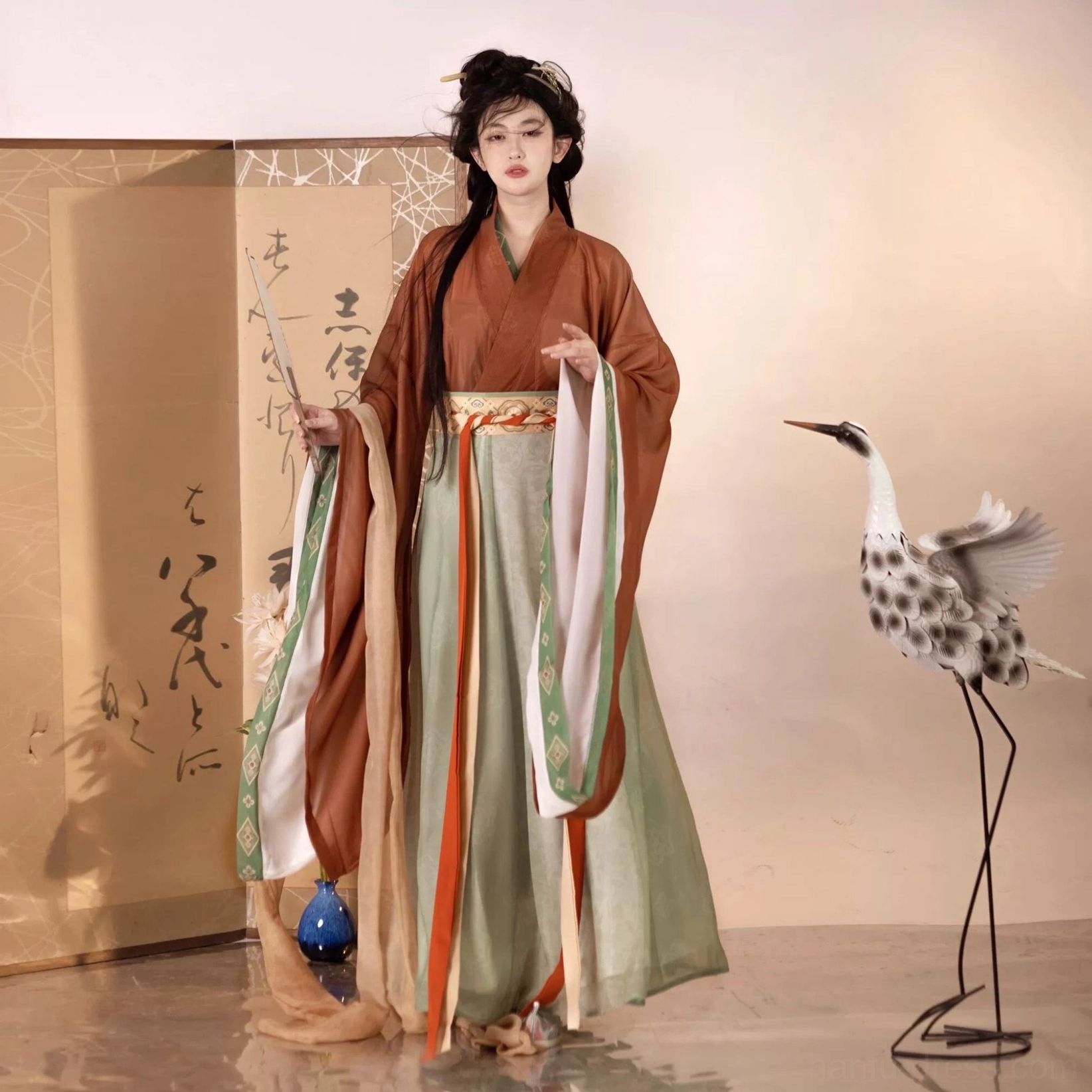 Wei Jin Dynasty Qiyao Ruqun Hanfu full set in rust red, green, and white with layered wide sleeves, pleated skirt, and flowing waist ribbons