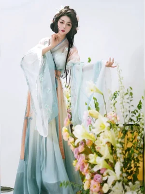 Wei Jin style qiyao ruqun Hanfu dress with flowing gradient fabric wide floral embroidered sleeves and orange waist sash