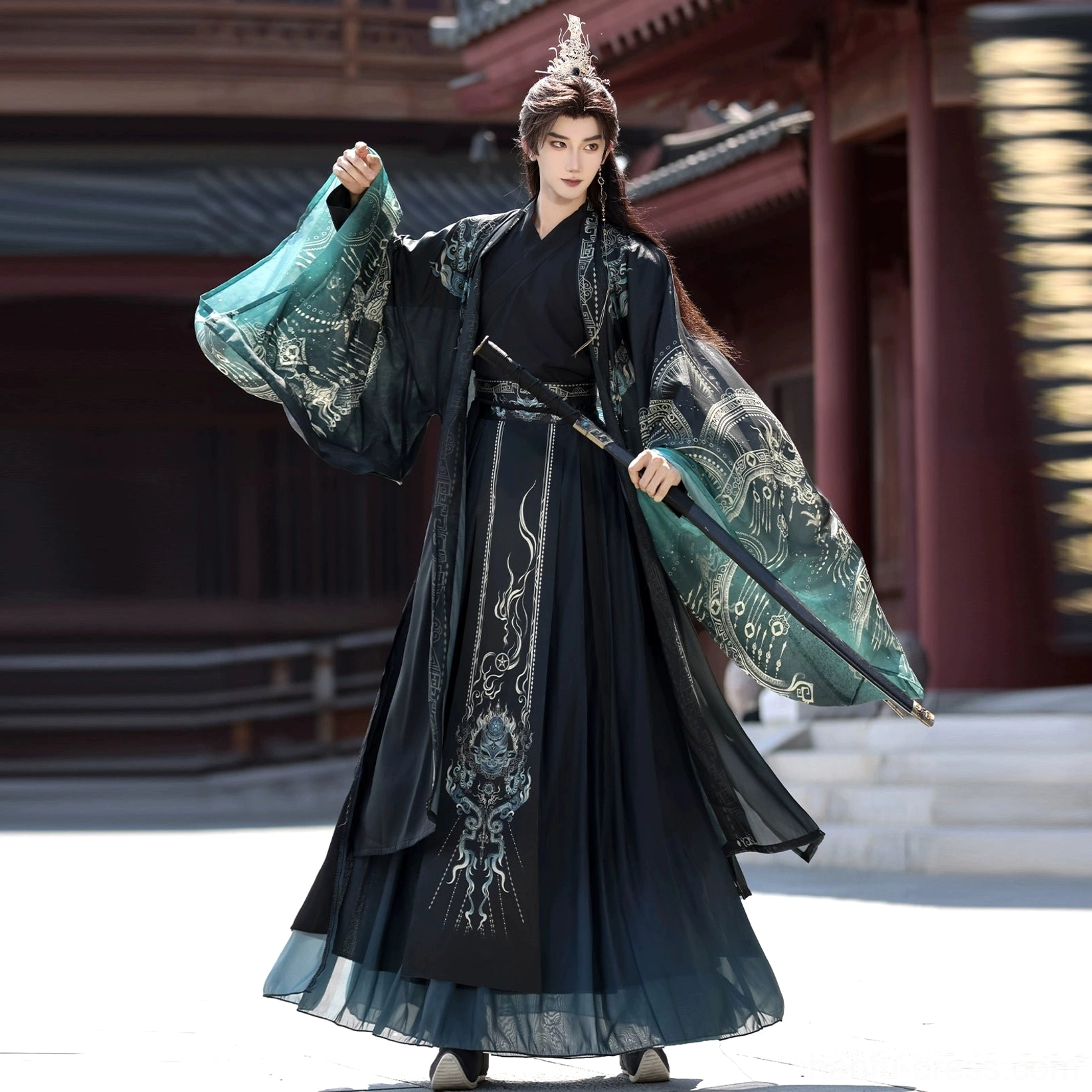 Black Wei Jin Hanfu for men and women with teal details, printed robe, and immortal sleeves