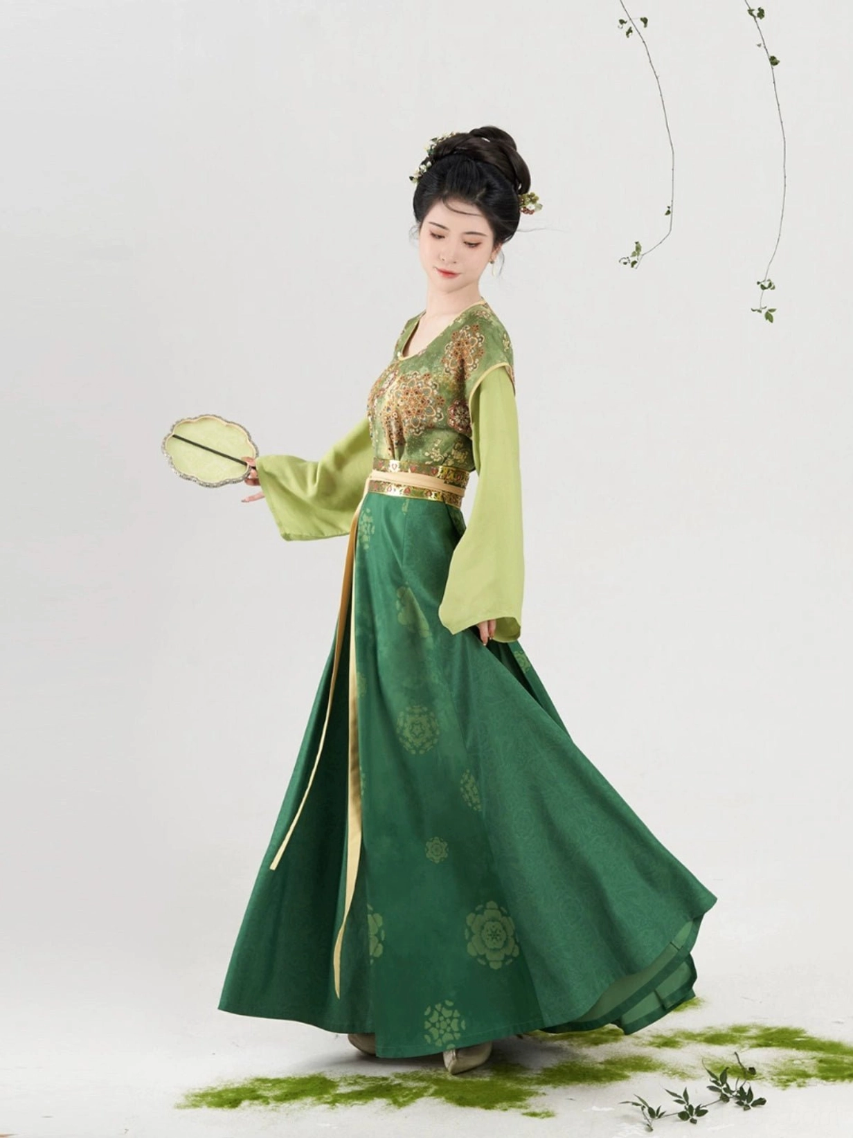 Side view of Weiyang modern Tang Dynasty Hanfu set with golden waist sash and long green wrap skirt