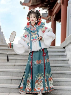 White Chinese New Year Hanfu outfit with embroidered cloud collar and dark teal lion dance mamian skirt shown beside traditional Chinese stone stairs