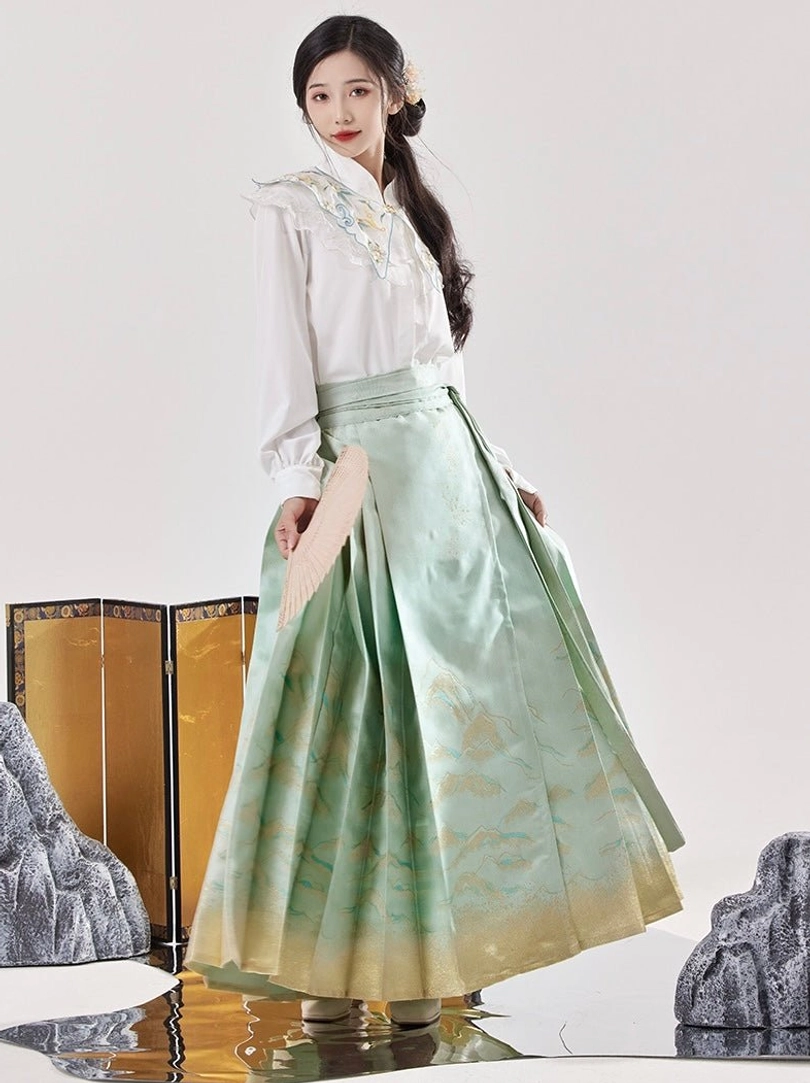 White and light green modern Ming Dynasty Hanfu set with stand collar blouse and flowing mamianqun horse face skirt