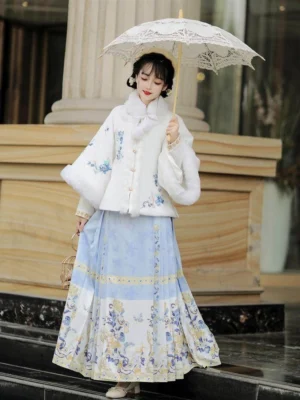 Front view of white Ming Dynasty Hanfu set with blue porcelain-inspired printed mamian skirt and elegant traditional Chinese styling