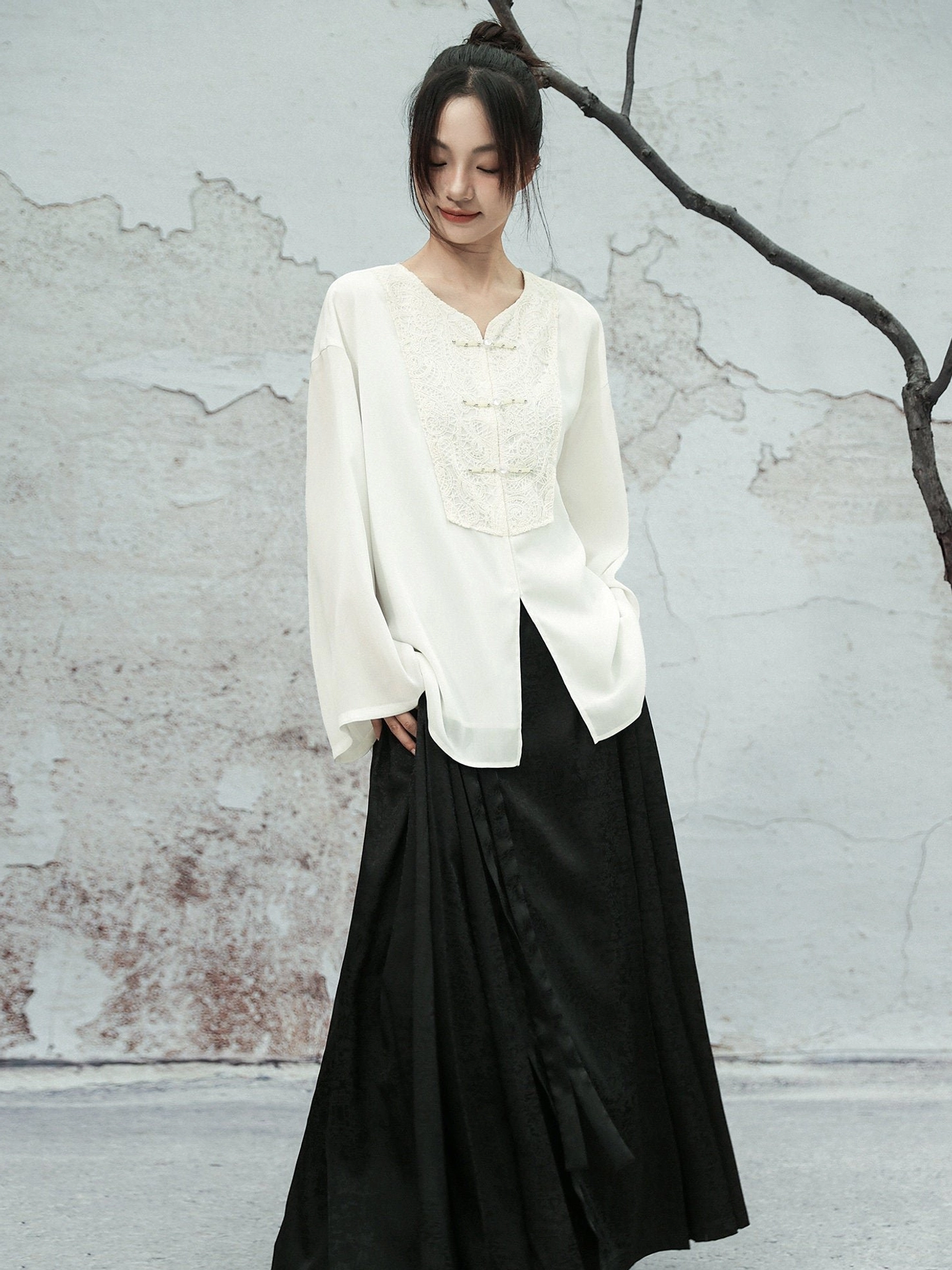 Full-length front view of a white Modern Hanfu lace embroidered chiffon blouse with relaxed loose fit and long sleeves