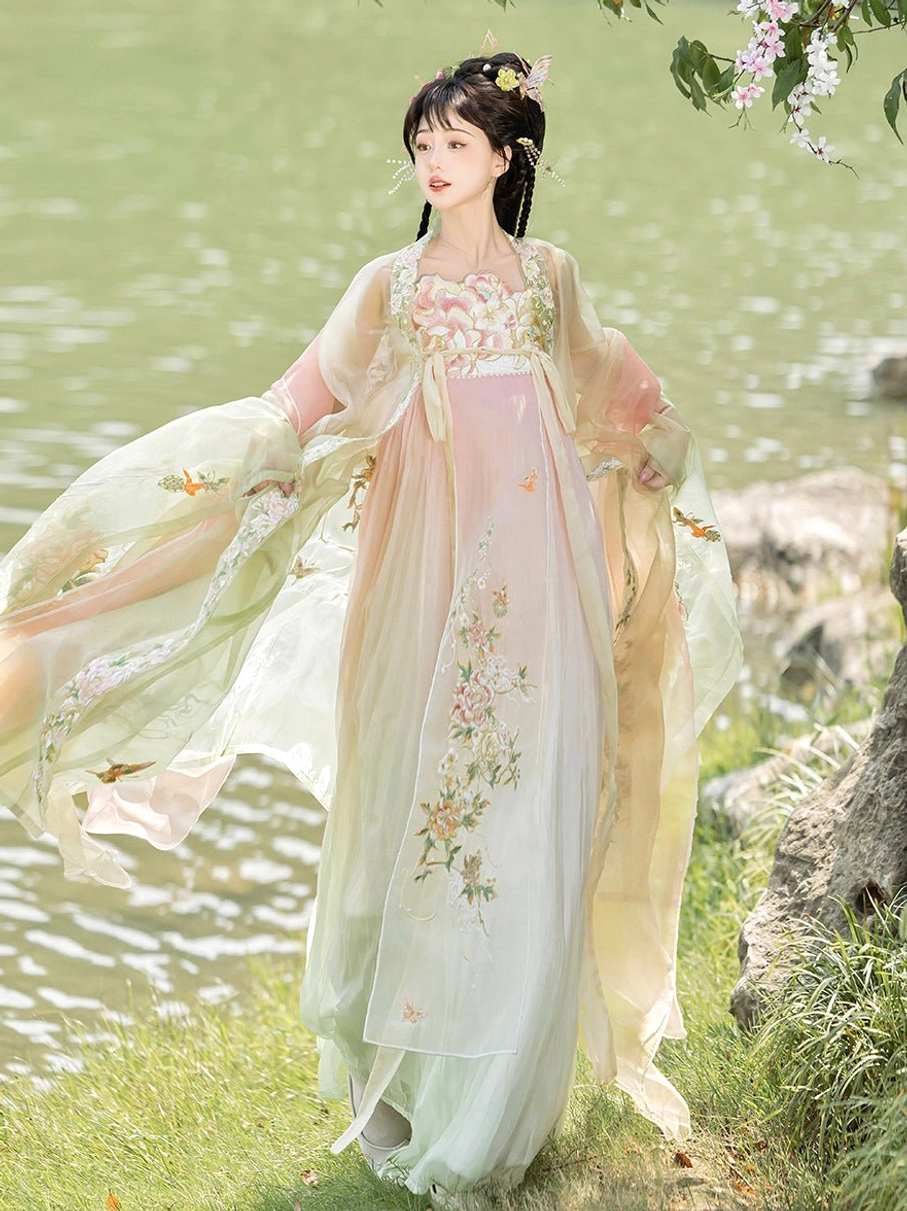 Tang Dynasty-style Heziqun Hanfu dress in an apricot and mint green gradient with floral embroidery and flowing sheer cape