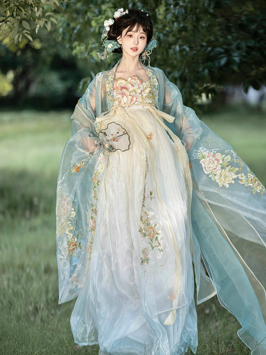 Blue and ivory Tang Dynasty Hanfu Heziqun dress with embroidered gown, sheer outer cape, flower hairpins, and round silk fan