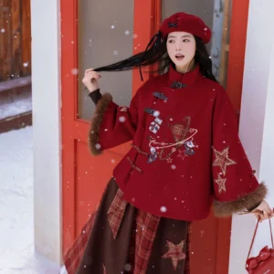 Front view of wine red neo Chinese New Year plaid jacket with asymmetrical frog fasteners festive embroidery and star sleeve details