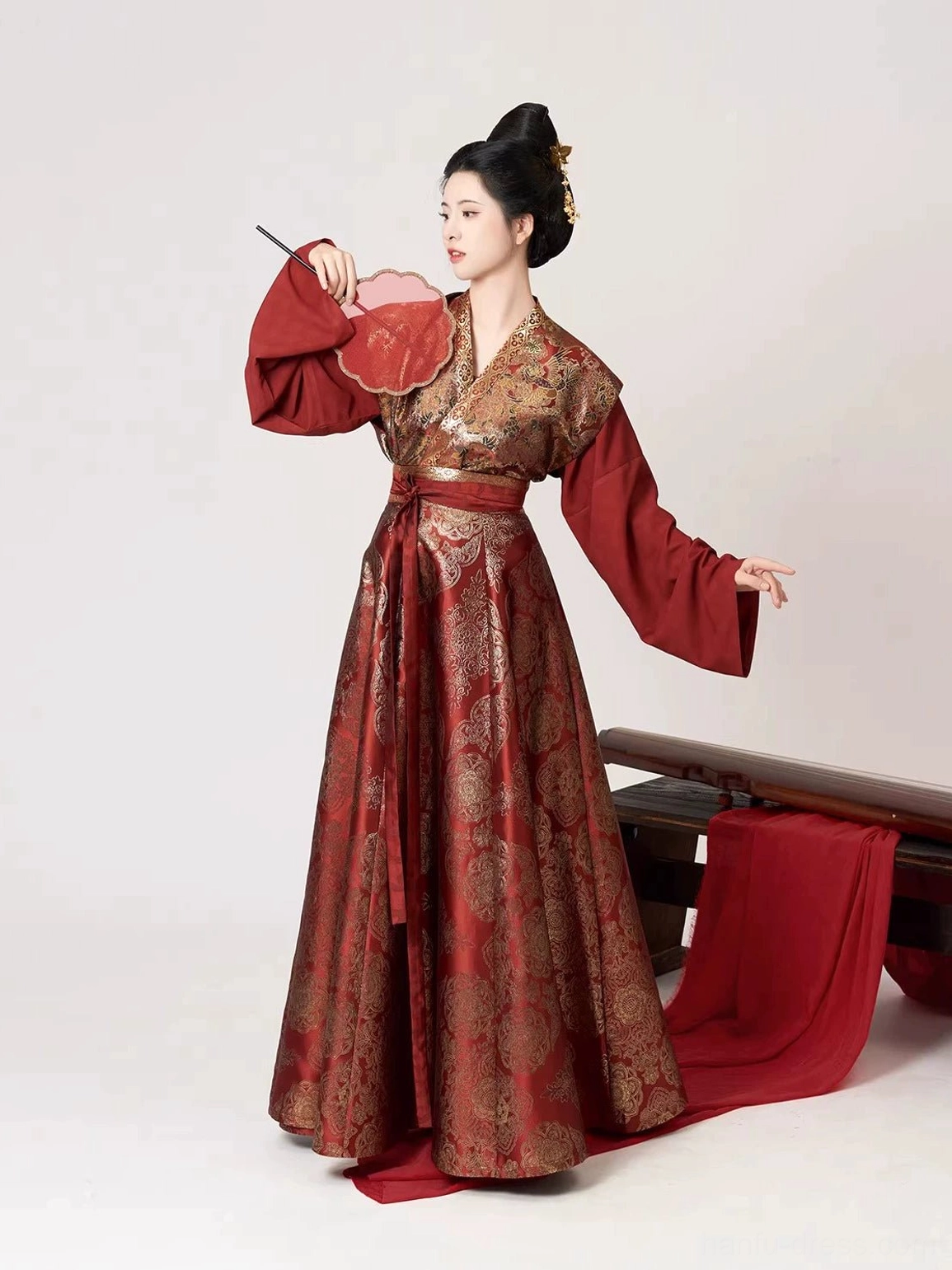 Wine red Tang style Hanfu set with round fan, wide sleeve inner top, gold patterned overlay, and full skirt