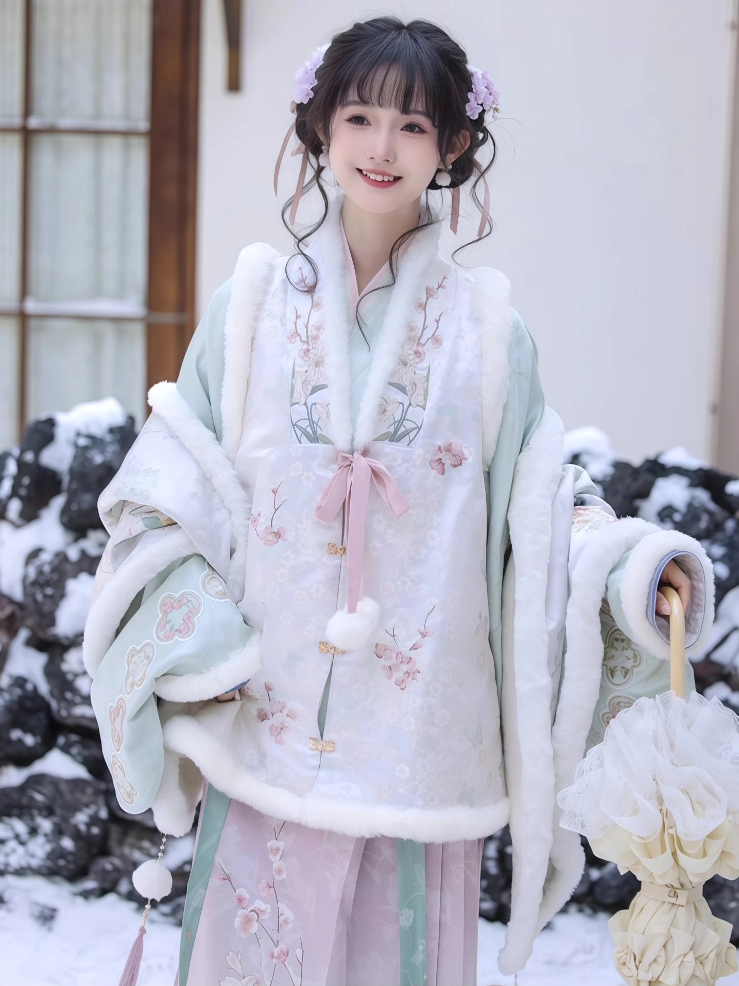 Close view of winter Ming style Hanfu showing pink bow embroidered vest plush cuffs and wide pipa sleeves