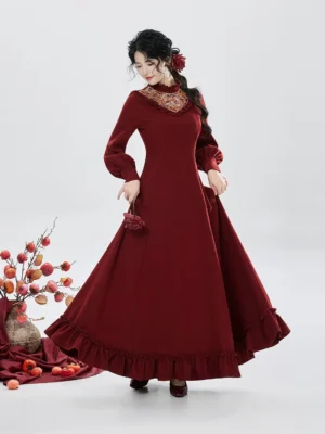 Winter Persimmon burgundy Chinese New Year Hanfu-inspired maxi dress with bishop sleeves and ruffled hem, left three-quarter view