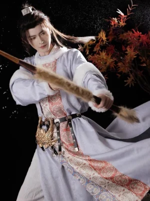Front view of Tang Dynasty inspired hanfu for men with snowy white trim, patterned brocade panels and traditional archery pose