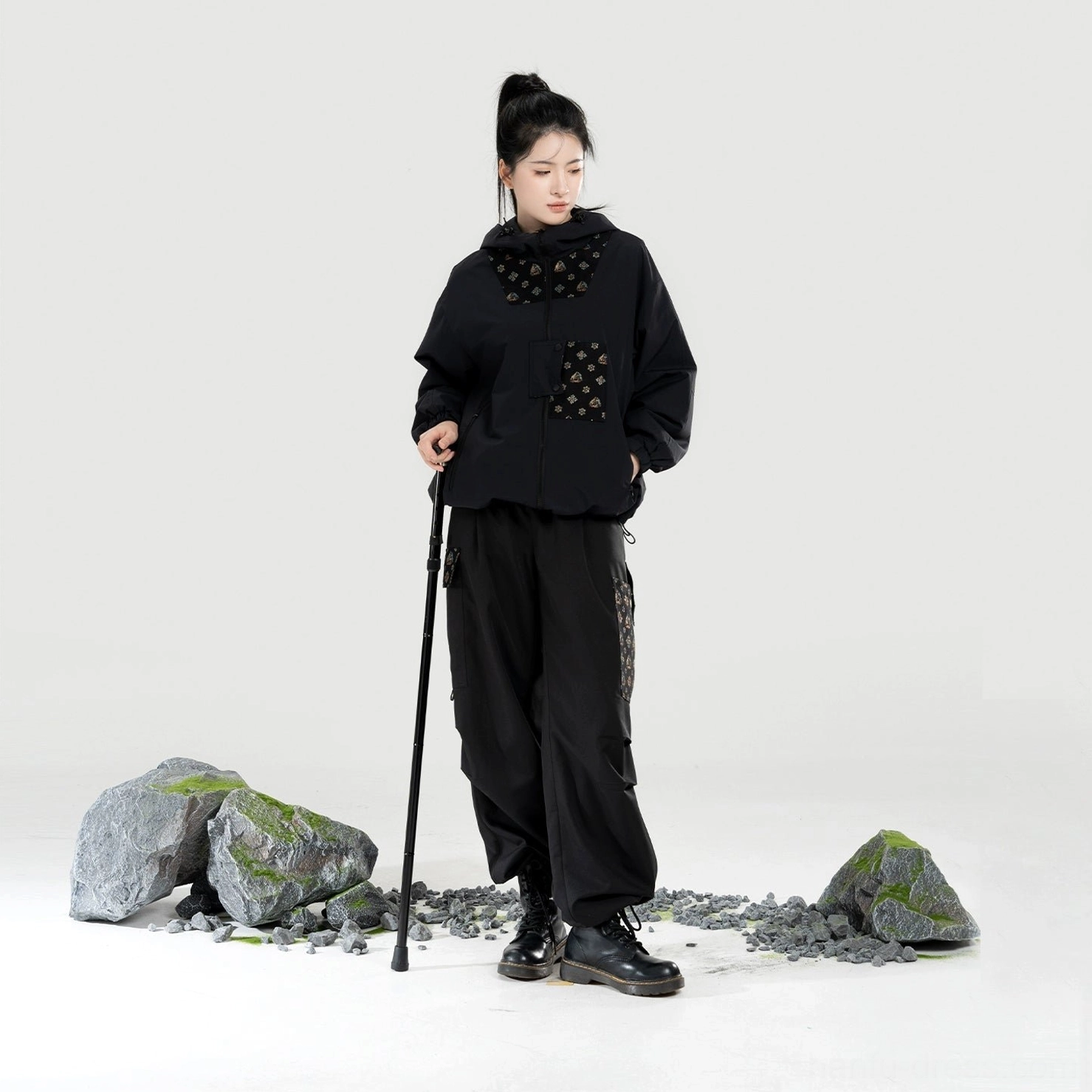 Women’s black Modern Hanfu hooded jacket and utility pants full set showing the complete contemporary Chinese-style outdoor outfit