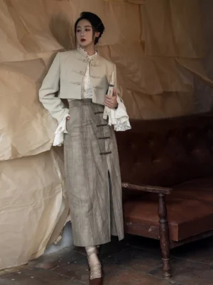Full front view of a women's New Chinese Style Hanfu outfit with cropped stand collar blazer and high waisted plaid skirt