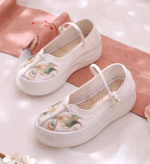 Women's milky white Hanfu shoes with butterfly embroidery, ankle strap, bead ornament, woven insole, and thick rubber platform sole
