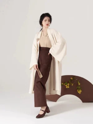 Wood Hibiscus modern Song Dynasty Hanfu set shown in a full-length side view with cream winged sleeve cardigan and dark brown wrap skirt