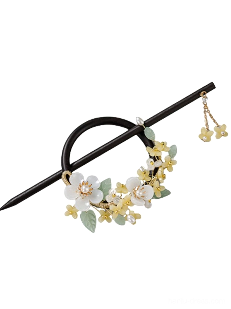 Complete wooden osmanthus hair pin set displayed from above with circular hair ring floral ornament hair stick and tassel