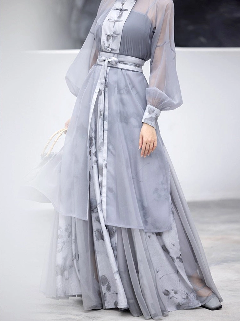 Close view of Wuji modern hanfu sheer robe lantern sleeves printed trim and tied waist sash
