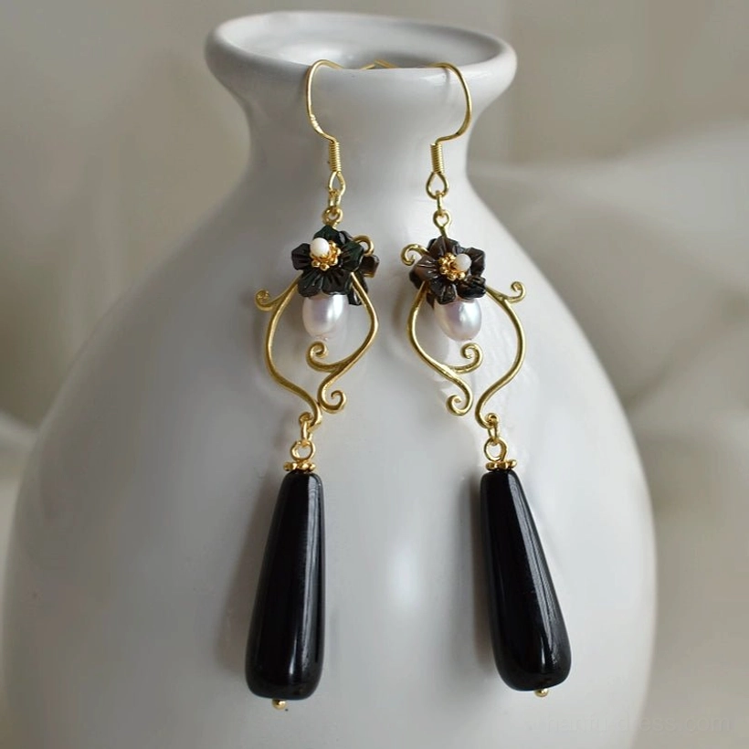 Xi Wei matching Hanfu drop earrings with gold-tone hooks, black teardrop pendants, pearl-style beads and blue floral enamel-style ornaments