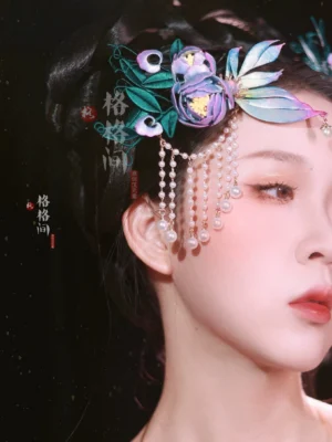Woman wearing a purple peony and gradient butterfly silk flower Hanfu hair pin with pearl forehead tassel jewelry against a dark starry background