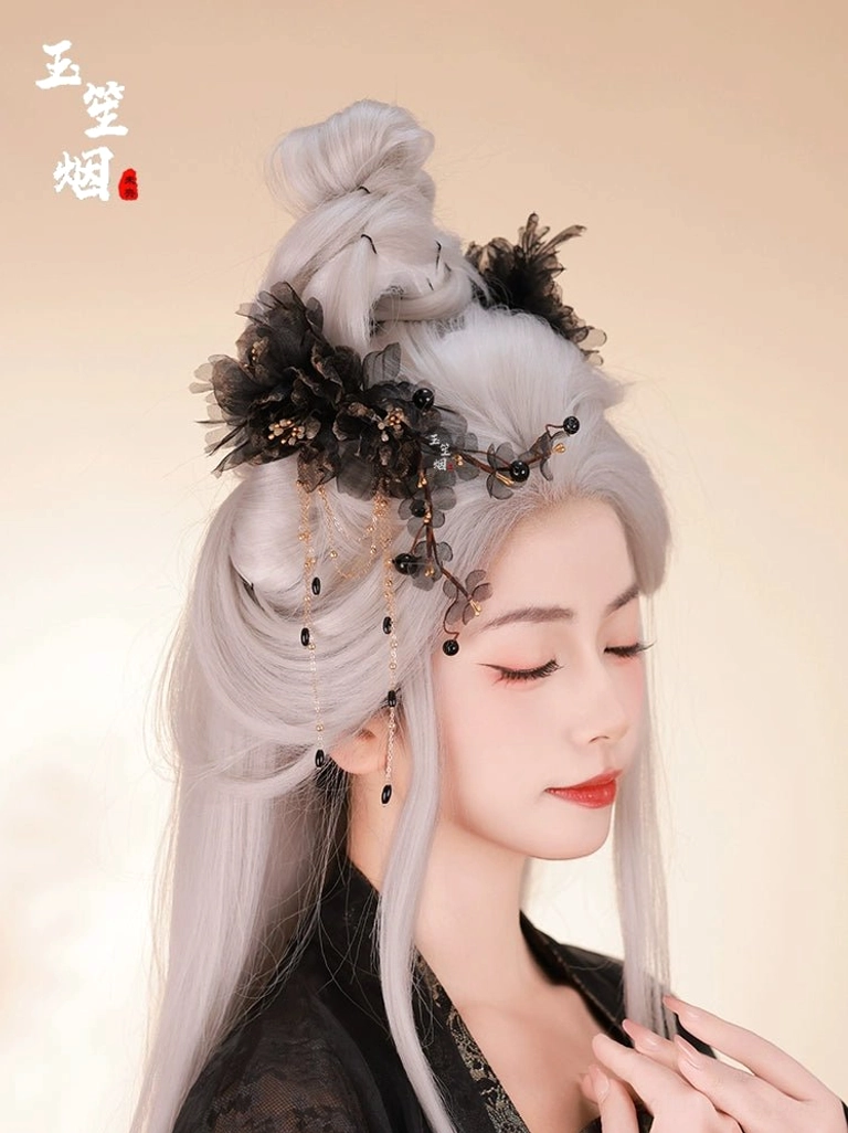 Side portrait of a model wearing a black Hanfu outfit and Xuanming floral hair accessory with dangling black bead tassels