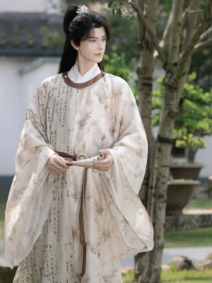 Yanchi Song Dynasty round collar hanfu robe for men with beige calligraphy landscape print, brown collar and waist sash front view