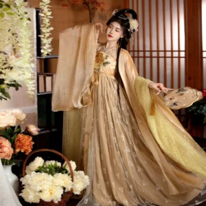 Full front view of golden Tang Dynasty Heziqun Hanfu dress with wide sleeve outer coat high waist skirt floral chest decoration and round silk fan