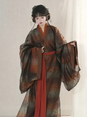 Front view of Yao Ling Warring States Han Dynasty Hanfu robe showing cross collar, flowing wide sleeves and long rust colored waist sash